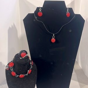 Beautiful handmade necklace.Are red ladybug shape  is a button